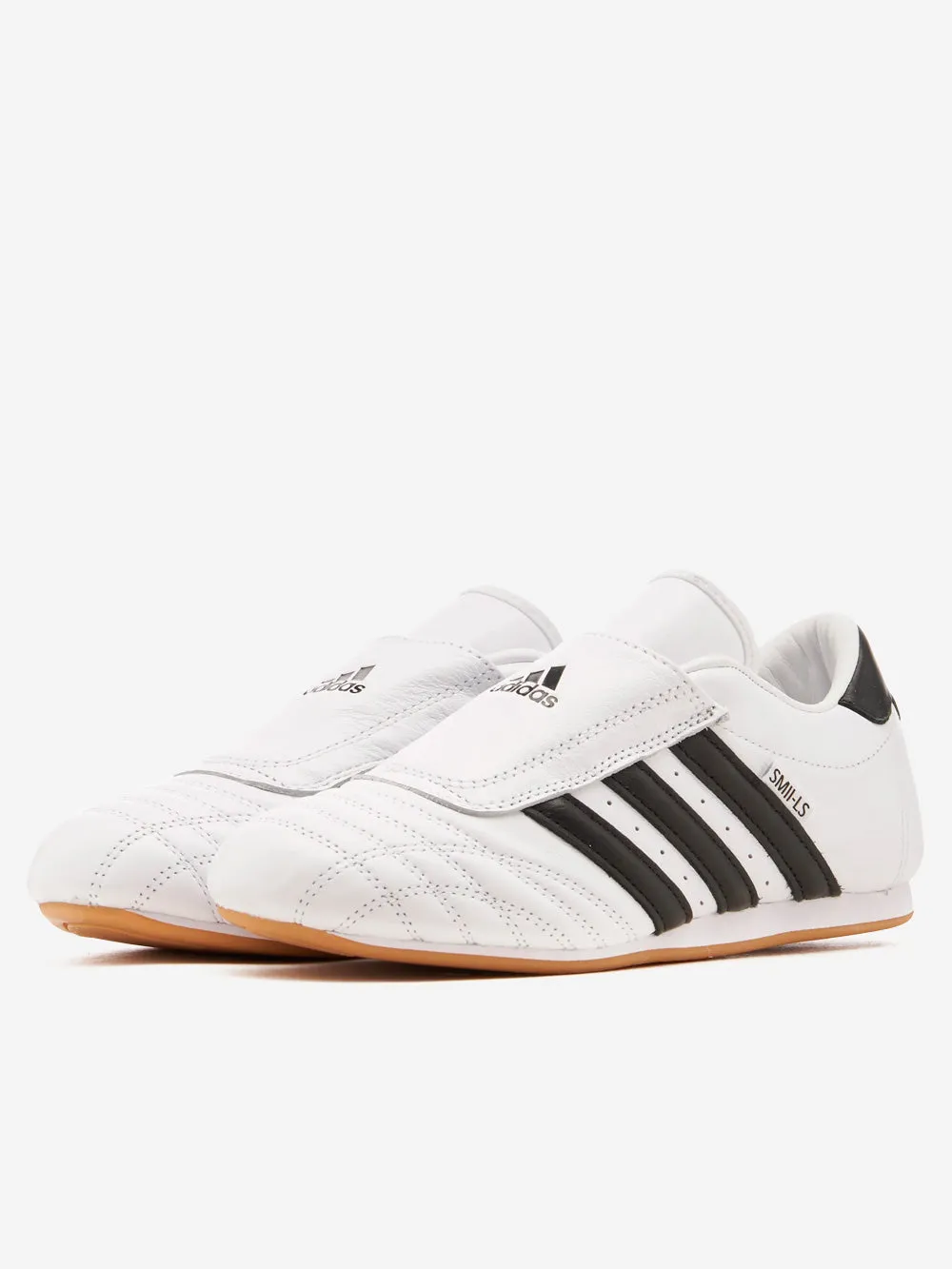 W Taekwondo slip-on bianche e nere