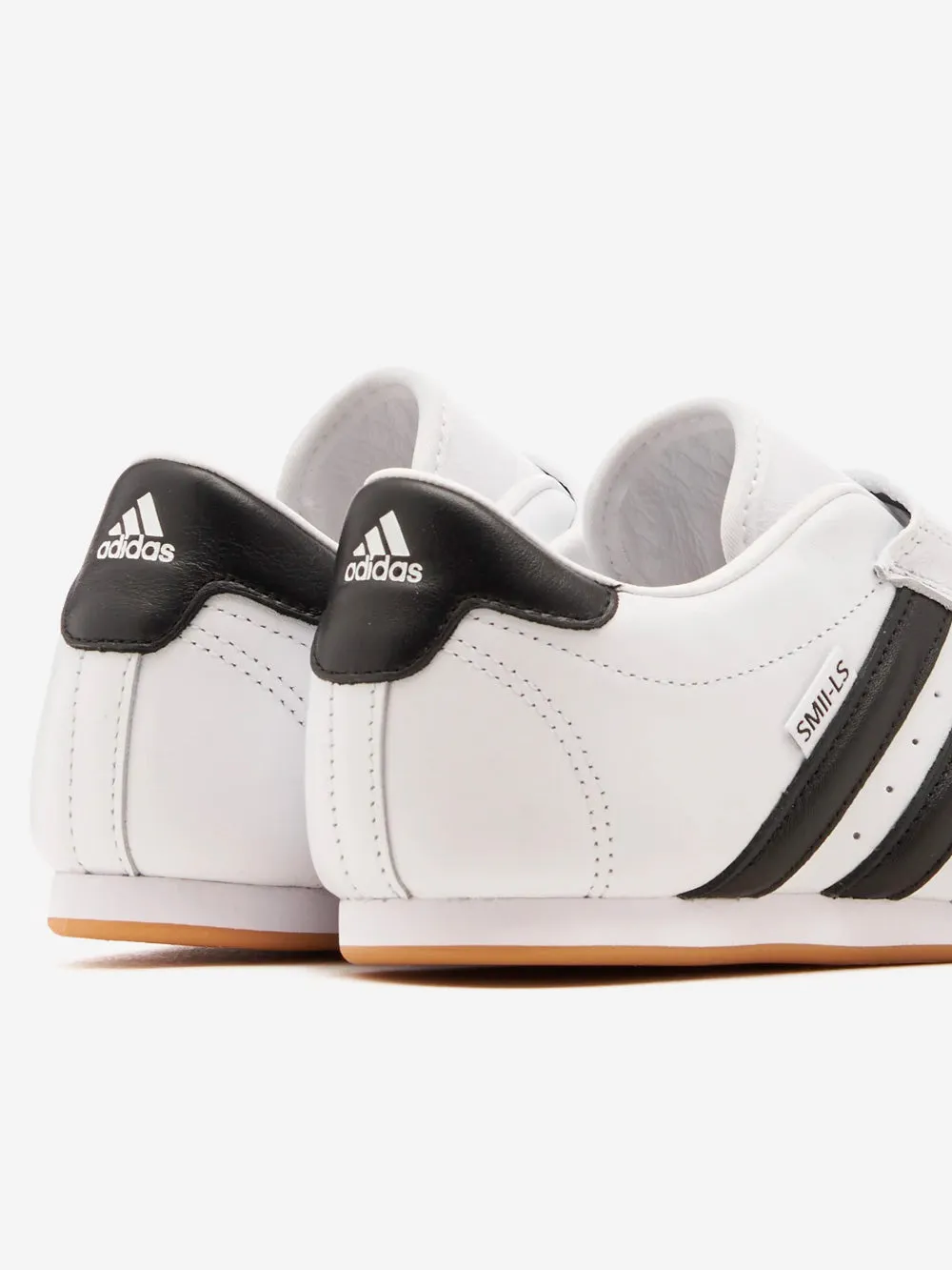 W Taekwondo slip-on bianche e nere