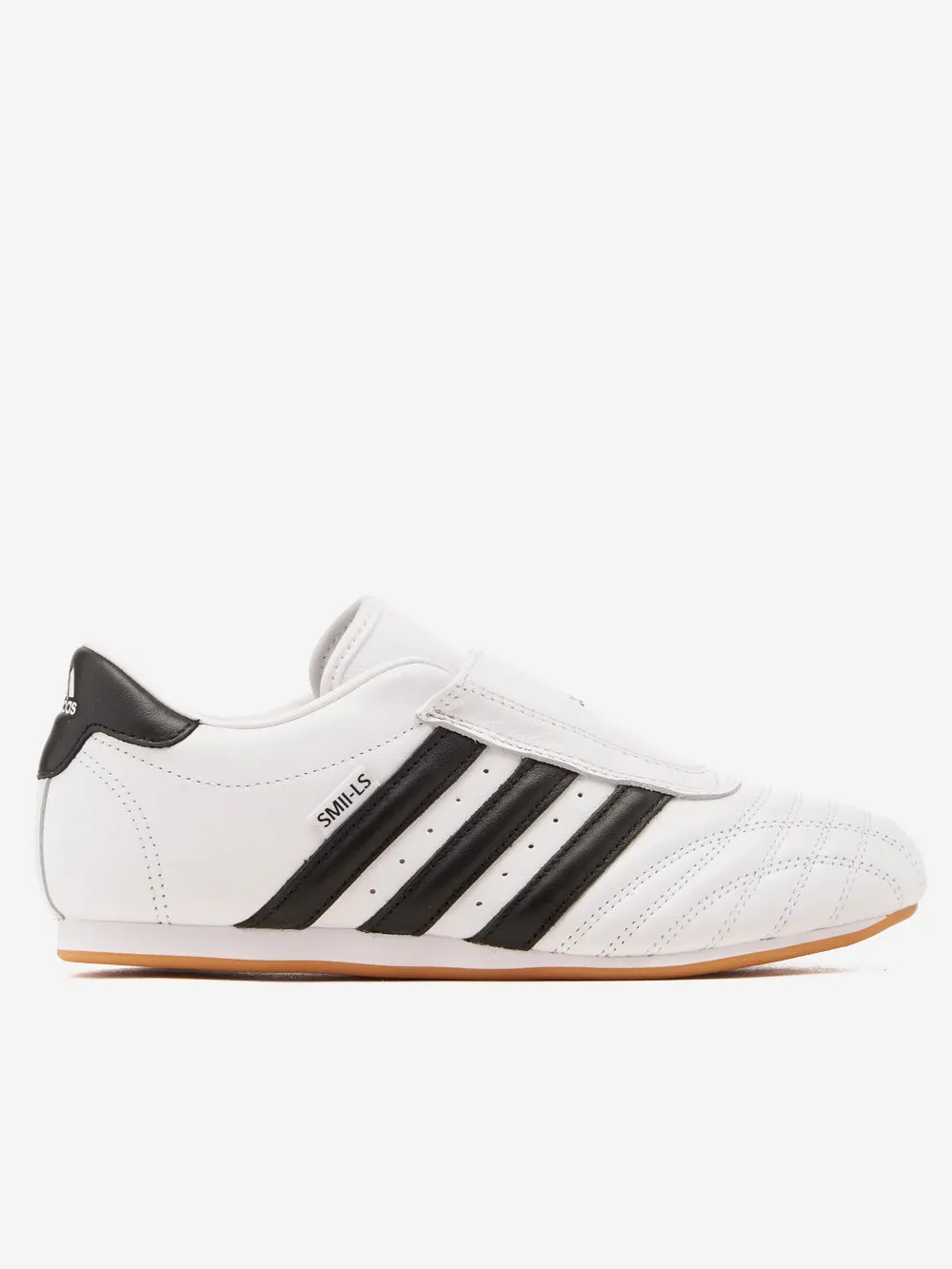 W Taekwondo slip-on bianche e nere